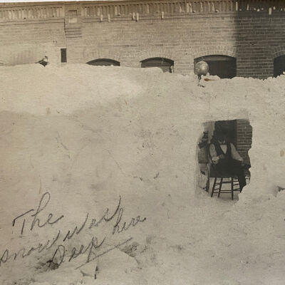 Man behind snowbank