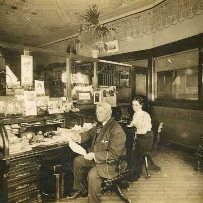 E. Y. Sarles inside the First National Bank of Hillsboro