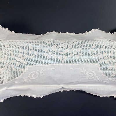 Blue Satin Pillow Covered By A Linen Embroidered Pillow Cover