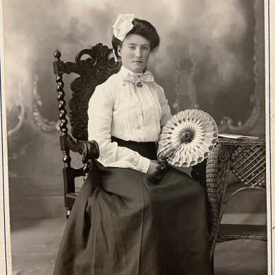 Unknown woman holding fan