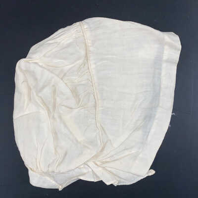 Child’s White Bonnet