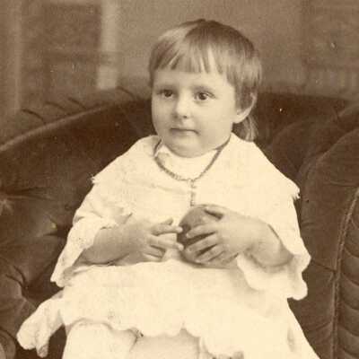 Unknown small child holding ball