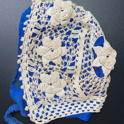 Crocheted Baby Cap with Blue Silk Lining