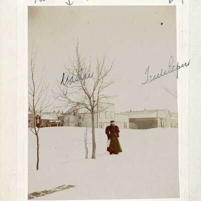Woman in snow near the Courthouse