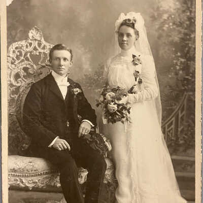 Couple - name on back - E. H. Lynner?