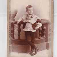 Young Boy in Decorative Collar with Oversized Bow — Studio Portrait
