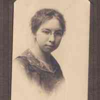 Portrait of Young Woman with Spectacles and Lace Collar