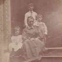 Family Portrait on Steps of Home