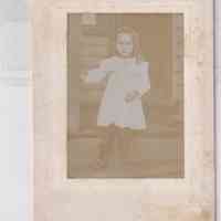 Portrait of Young Girl Standing on Porch Steps