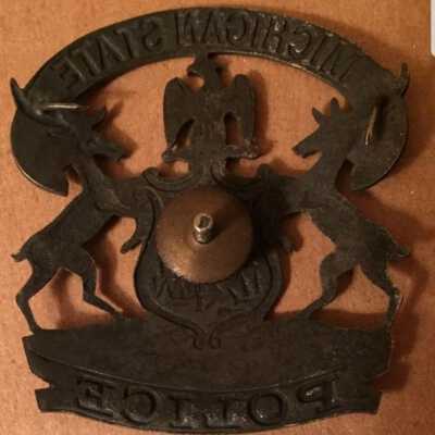 Back of badge from very similar (but different) die