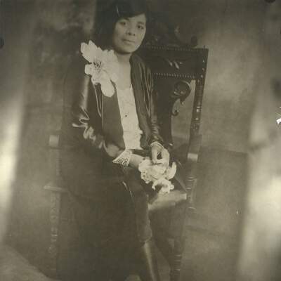 Woman with Flower Pin