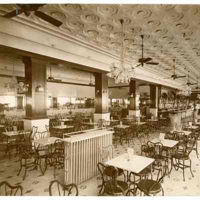2023.057.077 Recto: Black and white photograph of the interior of a restaurant in Chattanooga circa 1890.