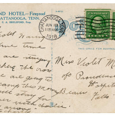 2022.087.001 Verso: Written correspondence on rear of Grand Hotel postcard