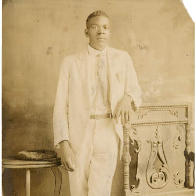 Man in White Suit