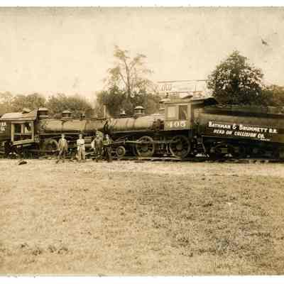 2022.057.071 Recto: Black and white photograph of the two crashed train engines of the Bathman & Brummett R.R. Head on Collision Company.