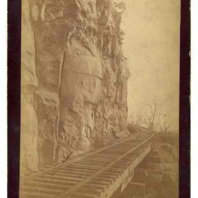 2022.057.056: Black and white photograph of the Narrow Guage Railroad tracks on Lookout Mountain, Tennessee