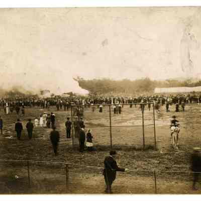 2022.057.073 Recto: Black and white photograph of the aftermath following the staged train crash at the 1913 GAR reunion