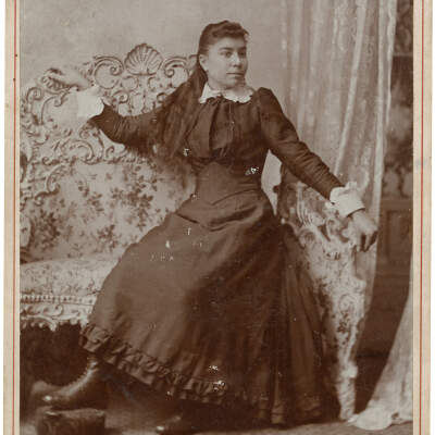 Woman on Love Seat