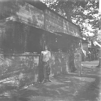 Glass Plate Negative, Young Man at Food Stand