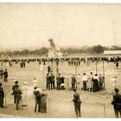 2022.057.072 Recto: Black and white photograph showing the moment the Bathman & Brummett Rail Road Head on Collision Company crashed two trains at the GAR reunion in 1913.