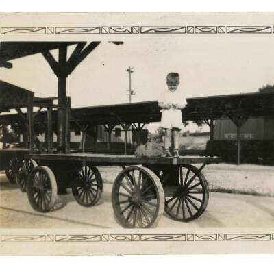 Boy on Baggage Cart