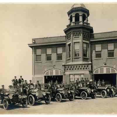 2022.057.045: Black and white photograph of the fire department and fireman of the station on Cameron Hill