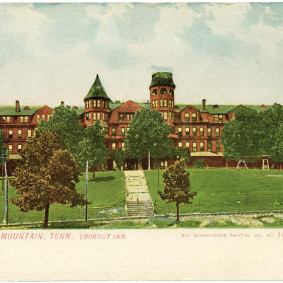 2020.494.002 Recto: Color tinted postcard showing the green roof of the Lookout Inn.