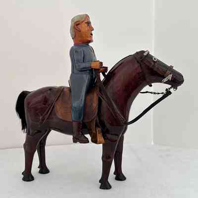 Man on Horse Carving