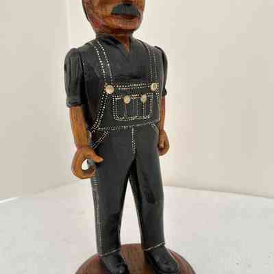 Carving, Man in Blue Overalls