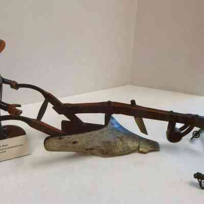 Carving, Man with Plow