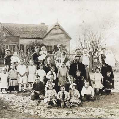 Sarah and James Elmer Hughes family portrait