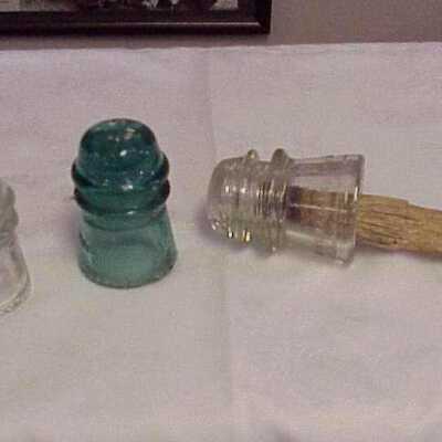Insulators and wooden post