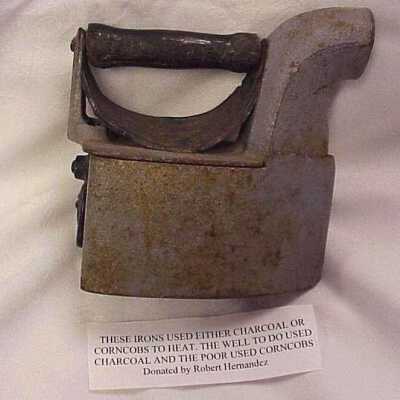 Iron used either Charcoal or Corn Cobb's to heat.