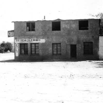 Cabins and Ice Cream Store on the North West corner of Mesquite Blvd. and Sandhill