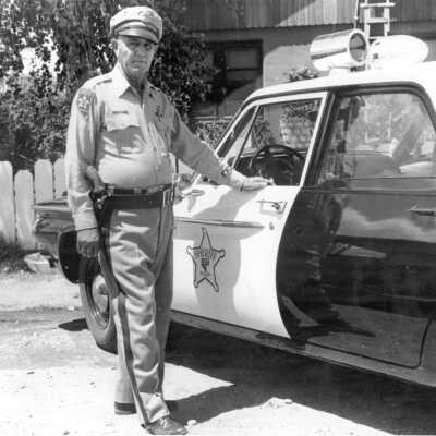 Oscar Abbott with Squad Car
