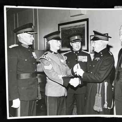 Photo - Accepting the baton from retiring band director