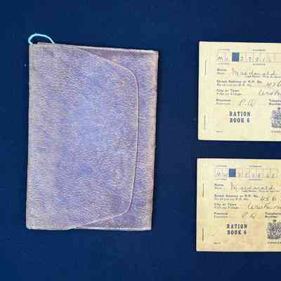 War Ration books in leather pouch
