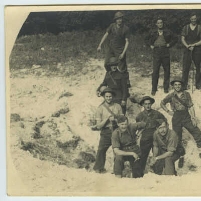 Group Portrait - Men in a Bomb Crater