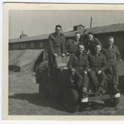 Group Portrait - Men on a Jeep
