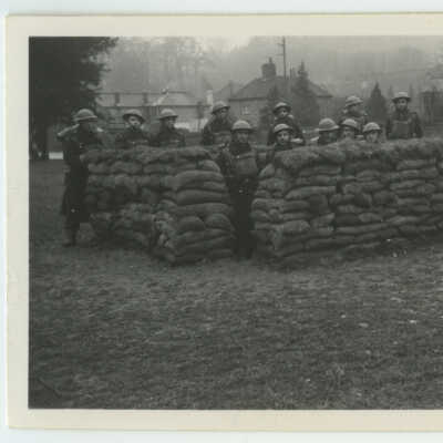 Twelve Men and their Sandbags