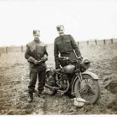 Jerry Gault and Thomas K. Scovil in a Field