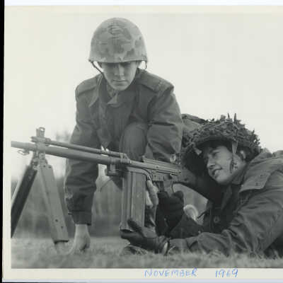 Private Patricia Elder Firing a LMG