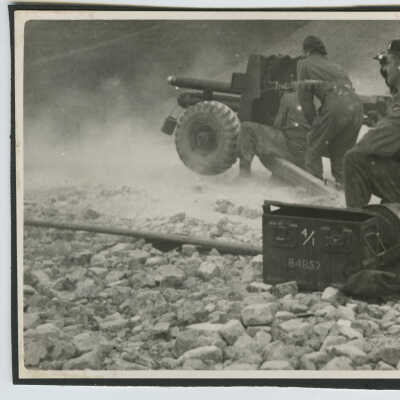 A QF 6 Pounder Hammering Away