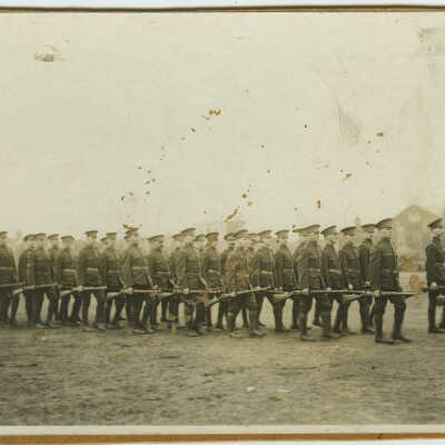 Soldiers Parading with Rifles at the Trail