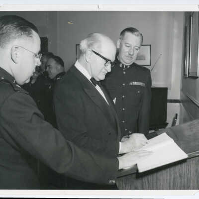 Signing the Officers Mess Guest Book