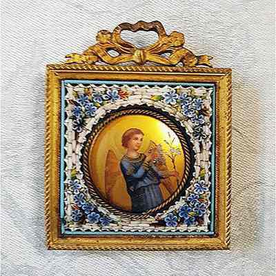 Framed porcelain portrait of an angel holding a lily, c. 1890s