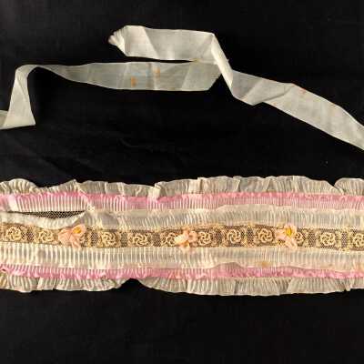 Ribbon style hat of blue and pink silk with lace and silk flowers, 1915