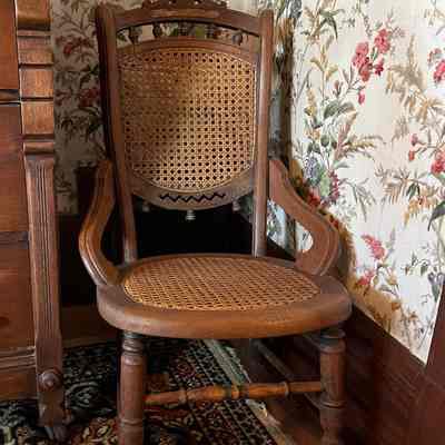American Walnut Child's caned rocking chair of Wm. Frederick Simpson, c. 1878-1880