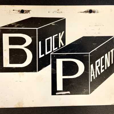 Sheet metal 'Block Parent' plaque, organized by the Police Department, prior 2006