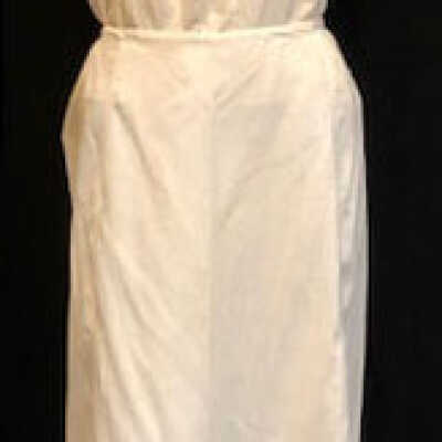 White linen peticoat with embroidered ruffle overlay hem, early 1900s